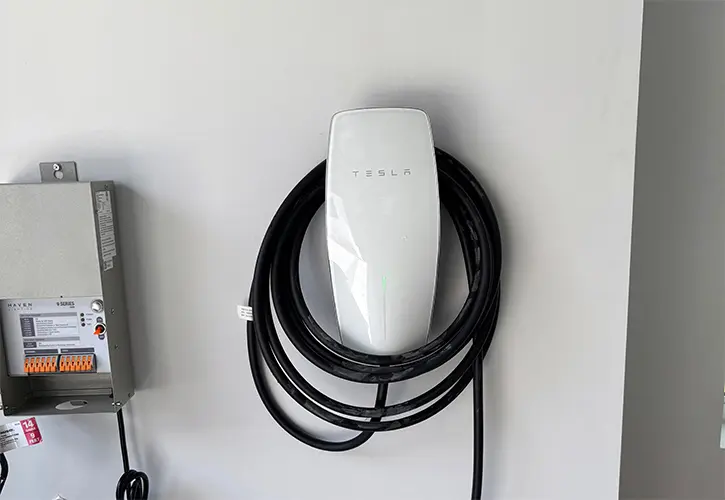 Electric vehicle connected to a professionally installed home charger